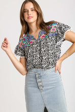 Load image into Gallery viewer, Umgee Animal Print Top with Flower Embroidery and Pom Pom Fringe Detail in Black Top Umgee   
