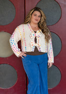 RARERAW Pom-Pom Knit Cardigan With Rainbow Bow Accents in Cream