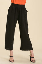 Load image into Gallery viewer, Umgee Wide Leg Pants with Elastic Waist Band &amp; Unfinished Hem in Black Pants Umgee   
