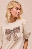 BiBi Solid Color Woven Top with Mesh Leopard Bow Front in Cream