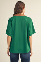 Jodifl Faux Leather Accent Drop Shoulder Solid Top in Green