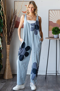 Oli & Hali Large Flower and Paint Splatter Jumpsuit in Light Blue