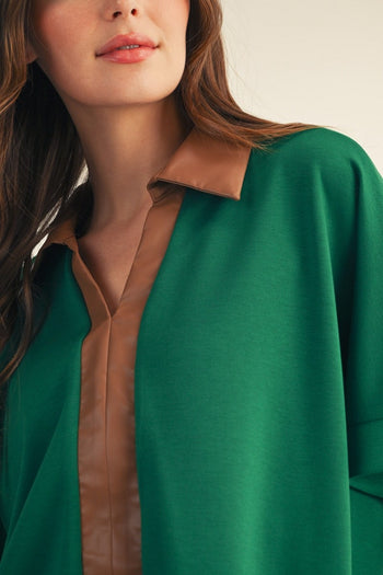 Jodifl Faux Leather Accent Drop Shoulder Solid Top in Green