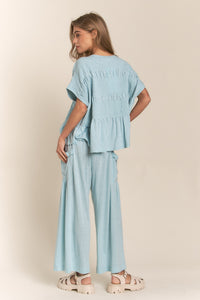 J.nna Solid Color Smocked Top in Celeste Blue