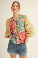 Jodifl Front Bow Tie Color Block Floral Peplum Top in Multi ON ORDER