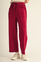 Jodifl Drawstring Waist Raw Cut Detail Sweatpants in Burgundy