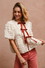 Load image into Gallery viewer, BiBi Textured Woven Peplum Bow Tie Top in Cream
