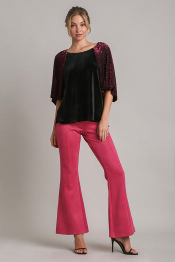 Umgee Solid Velvet Top with Animal Print Burnout Sleeves in Black