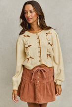 Load image into Gallery viewer, So Me Ribbon and Rose Applique Cardigan in Cream/Camel
