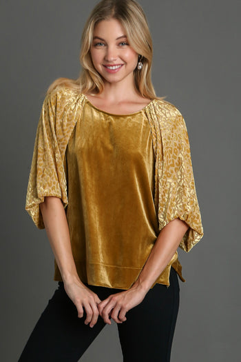 Umgee Solid Velvet Top with Animal Print Burnout Sleeves in Gold