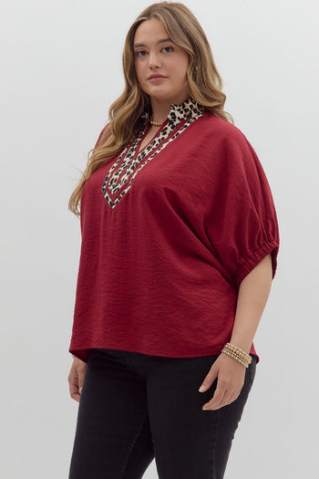 Entro Solid Color Dolman Top With Leopard Print Trim in Garnet