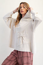 Load image into Gallery viewer, Easel Solid Color Terry Knit Bow Patch Hooded Top on Ecru
