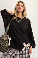 Easel Solid Color Terry Knit Top with Applique Bows on Hem in Black ON ORDER