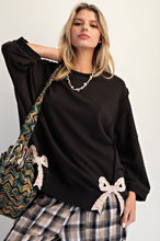 Load image into Gallery viewer, Easel Solid Color Terry Knit Top with Applique Bows on Hem in Black ON ORDER
