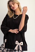 Easel Solid Color Terry Knit Top with Applique Bows on Hem in Black ON ORDER