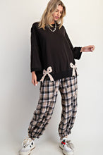 Load image into Gallery viewer, Easel Solid Color Terry Knit Top with Applique Bows on Hem in Black ON ORDER
