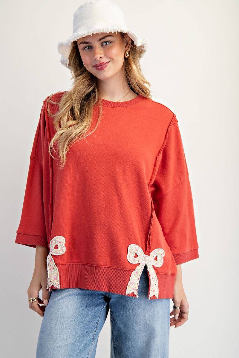 Easel Solid Color Terry Knit Top with Applique Bows on Hem in Boho
