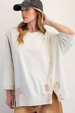 Load image into Gallery viewer, Easel Solid Color Terry Knit Top with Applique Bows on Hem in Ivory
