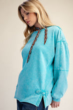 Load image into Gallery viewer, Easel Bow Tape Hem Washed Terry Knit Pullover Top in Day Blue
