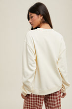 Load image into Gallery viewer, Wishlist French Terry Knit Top with Bow Print Front in Cream/Black
