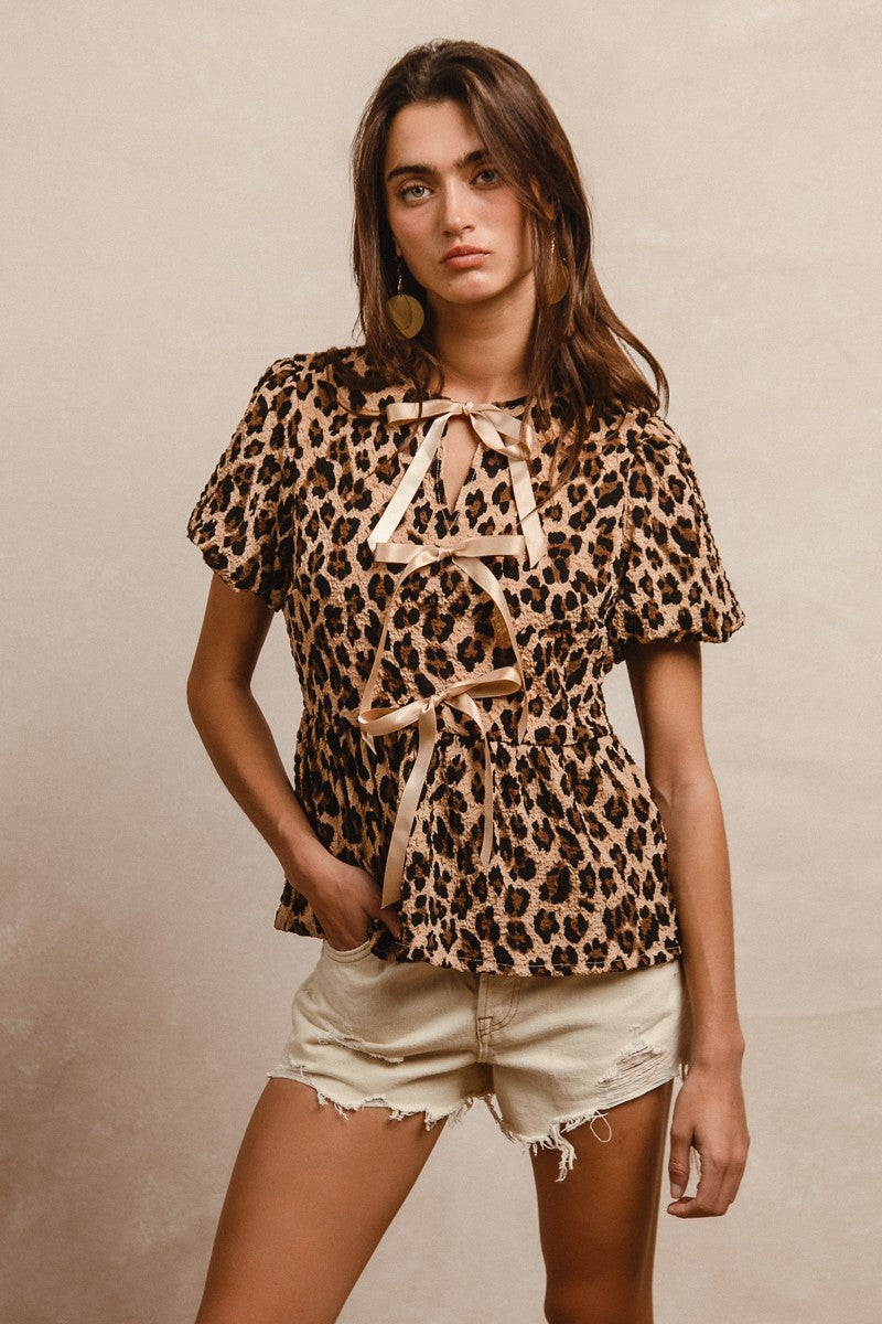 BiBi Textured Peplum Top with Ribbon Ties in Leopard