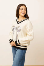 Load image into Gallery viewer, Emma+Grace Varsity Sweater with Sequin Bow on Front in Cream
