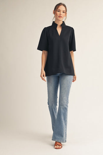Jodifl Standing Neckline Notched V Neck Solid Color Top in Black