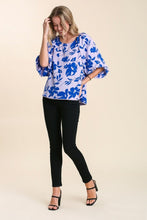 Load image into Gallery viewer, Umgee Graphic Floral Print Boat Neck High Low Split Hem Top in Lavender Mix Top Umgee   
