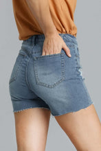Load image into Gallery viewer, Umgee High Rise Distressed Detail Elastic Back Stretch Denim Shorts with Raw Hem in Denim-FINAL SALE Shorts Umgee   
